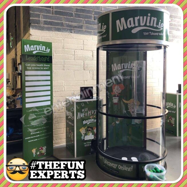 MARVIN CYCLONES.jpeg | Entertainment Solutions Cyclone machine for hire as promotional tool with participants grabbing prizes during event